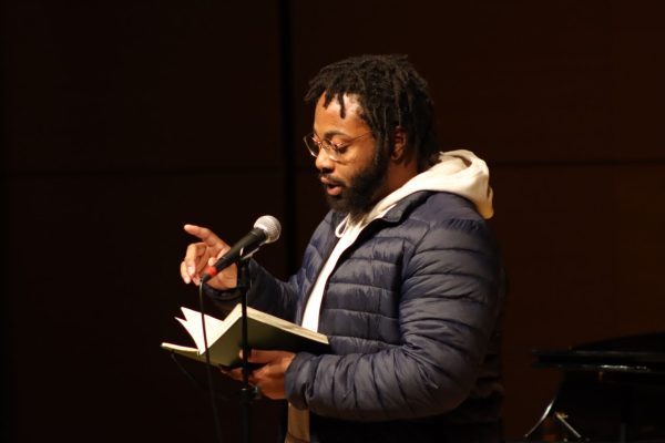 Texas State psychology senior Walt Ngegwe recites his poetry during the 38th Annual MLK Commemoration Celebration, Wednesday, Feb. 23, 2022, at the Performing Arts Center Recital Hall. Hosted by the Office of Institutional Inclusive Excellence - Student Initiatives (IIE-SI), the event was originally planned for Jan. 18 but was postponed to prevent the spread of COVID-19.