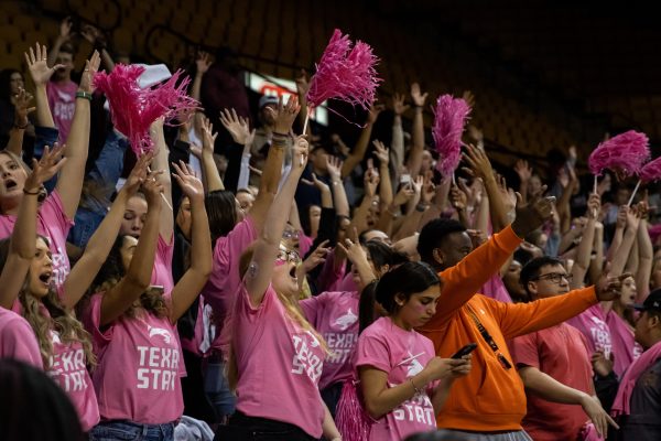 Texas State Bobcat Crew and fans cheer on the women's basketball team during a game against the University of Louisiana, Thursday, Feb. 10, 2022, at Strahan Arena. The Bobcats won in OT 72-71.