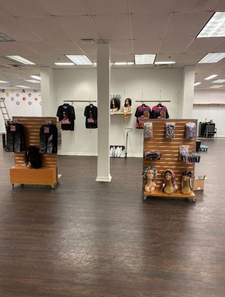 Phire Girl Inc. apparel and accessories line the walls and shelves inside Phire Girl Hair and Beauty Supply at the San Marcos Premium Outlets.