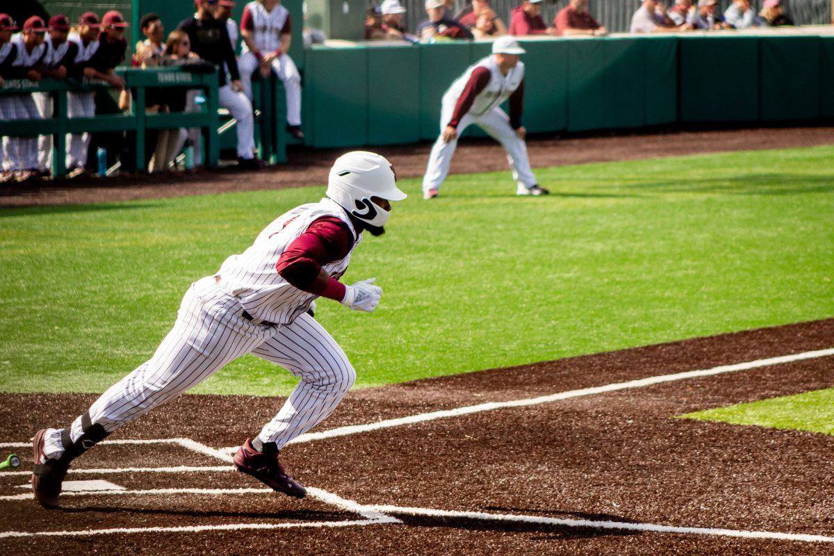 Texas State junior outfielder Ben McClain (4) makes a run for first base during a series against Utah Valley, Sunday, Feb. 20, 2022, at Bobcat Ballpark. The Bobcats won the series 3-1.