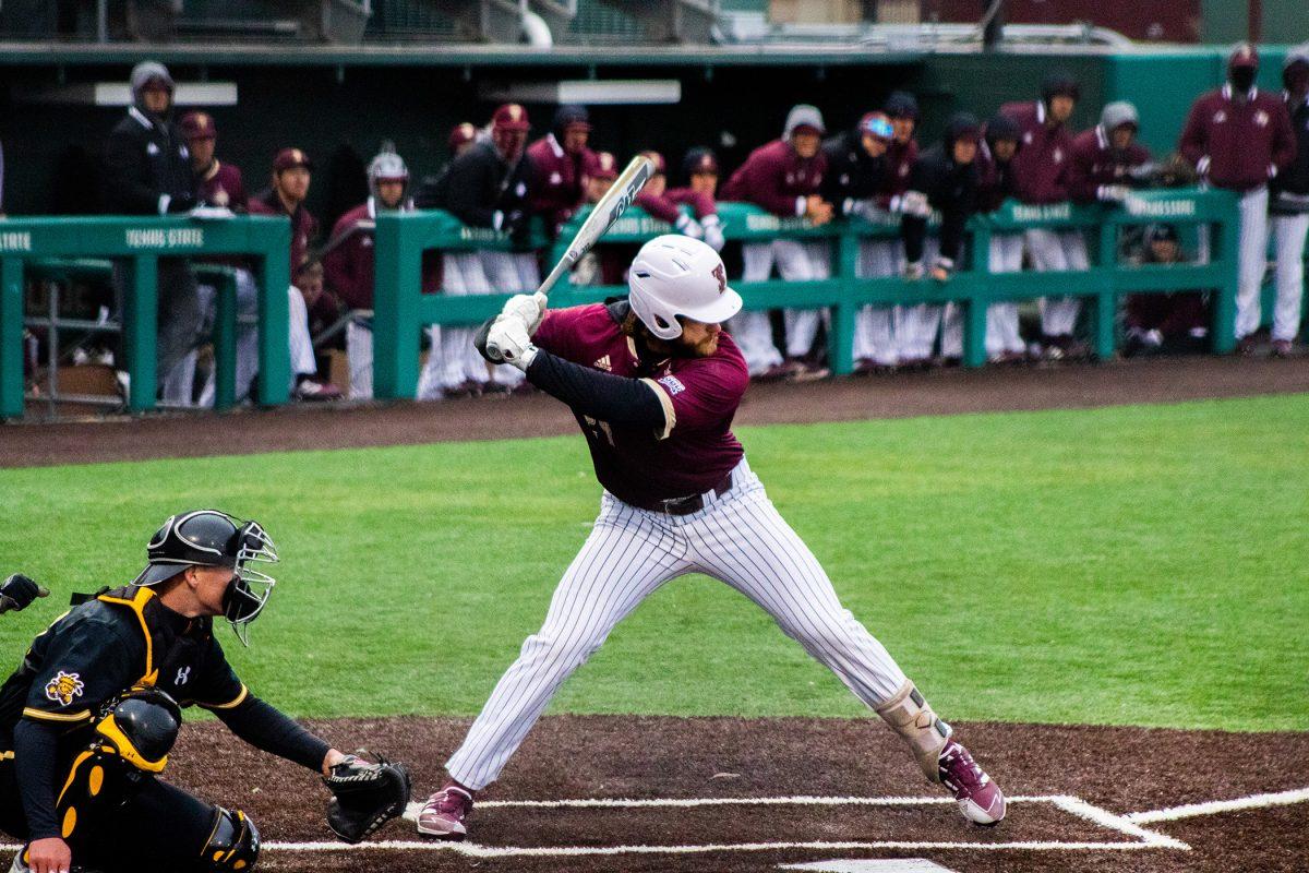 Texas State senior infielder Wesley Faison (24) winds up to hit a pitch during a game against Wichita State, Thursday, Feb. 24, 2022, at Bobcat Ballpark. The Bobcats won 9-2.