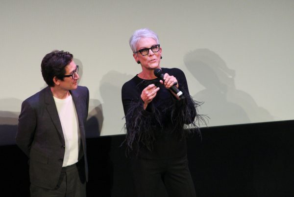 "Everything Everywhere All at Once" cast members Ke Huy Quan (left) and Jamie Lee Curtis talk to the audience, Friday, March 11, 2022, during the world premiere at the Paramount Theatre.