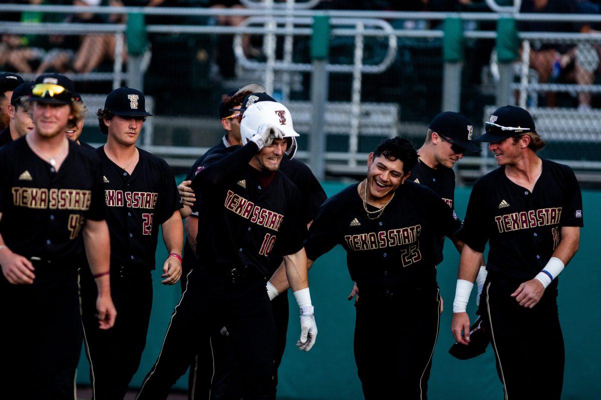 Texas State senior infielder Justin Thompson (10) celebrates a home run with his teammates during a game against Baylor, Tuesday, April 12, 2022, at Bobcat Ballpark. The Bobcats won 11-4. Junior designated hitter Jose Gonzalez (23) had just hit a home run on the at-bat prior.