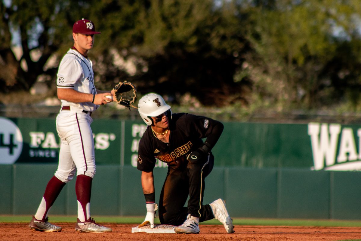 Texas State freshmen infielder Daylon Pena (16) slides into second base during a game against Texas A&M, Tuesday, April 5, 2022, at Blue Bell Park. The Bobcats lost to the Aggies 4-8.