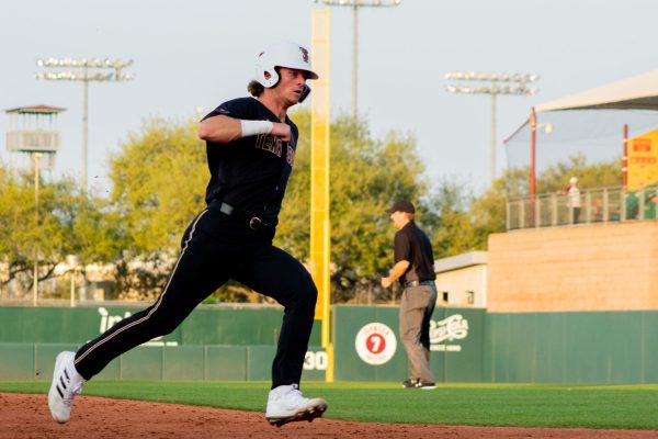 Texas State senior infielder Cameron Gibbons (11) makes a run for home plate during a game against Texas A&M, Tuesday, April 5, 2022, at Blue Bell Park. The Bobcats lost to the Aggies 4-8.