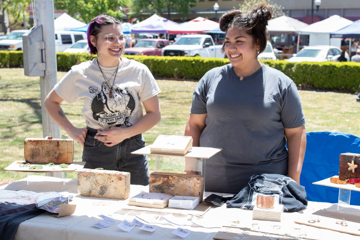 Members of the Texas State Metals Guild sell jewelry made by the club at Art Squared, Saturday, April 9, 2022, on the Courthouse lawn. The Metals Guild is a student group of artists interested in metals.