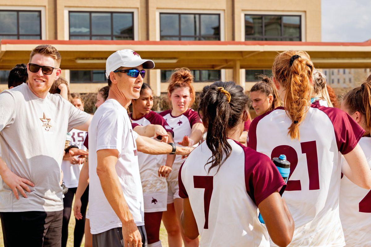 Texas State head soccer coach Steve Holeman breaks out the team after the spring game against Texas, Saturday, March 5, 2022, at Bobcat Soccer Complex.