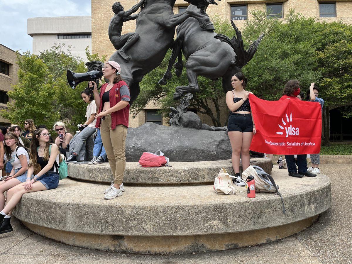 Texas+State+graduate+student+Abagail+Milam+speaks+at+the+Texas+State+Walkout+Rally+next+to+Texas+States+Youth+Democratic+Socialists+of+America%2C+Thursday%2C%26%23160%3Bon+Aug.+25%2C+2022%2C+on+The+Quad.