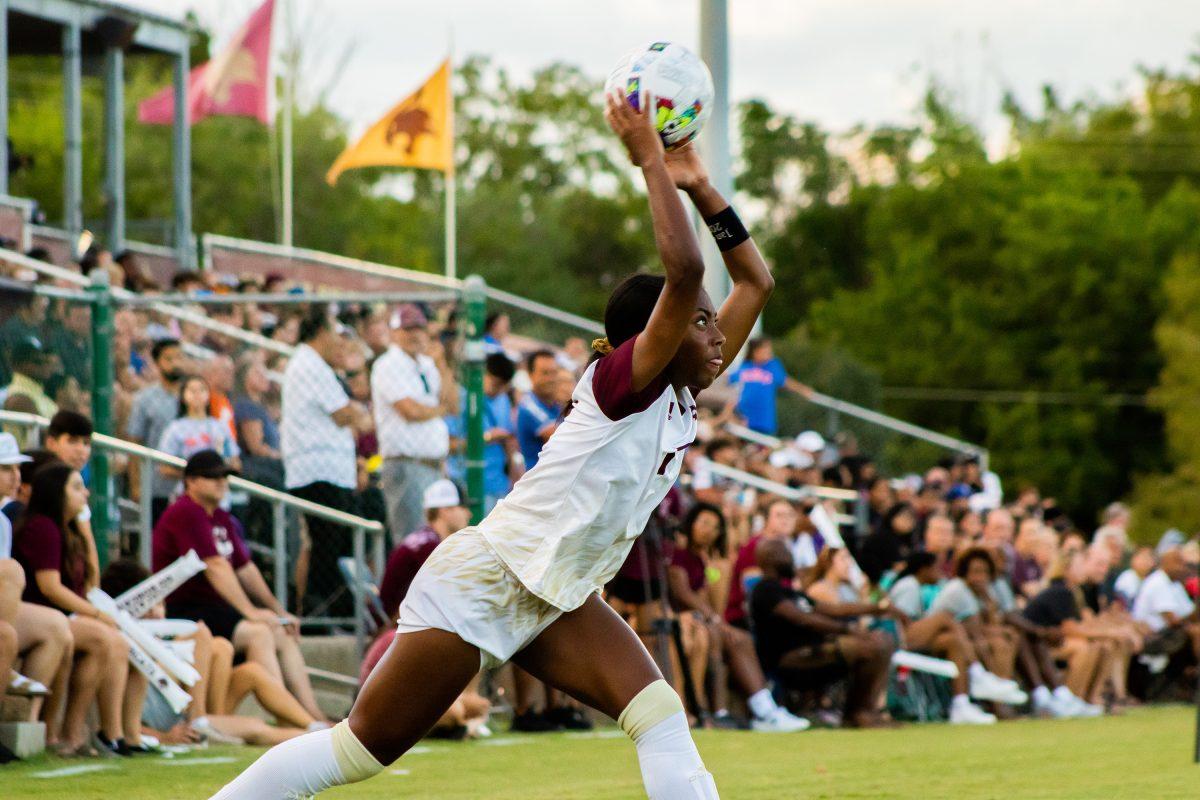 Texas State senior defender Kamaria Williams (7) tosses the ball back into play during a game against Houston Baptist, Sunday, August 28, 2022, at Bobcat Soccer Complex. The Bobcats won 2-1.