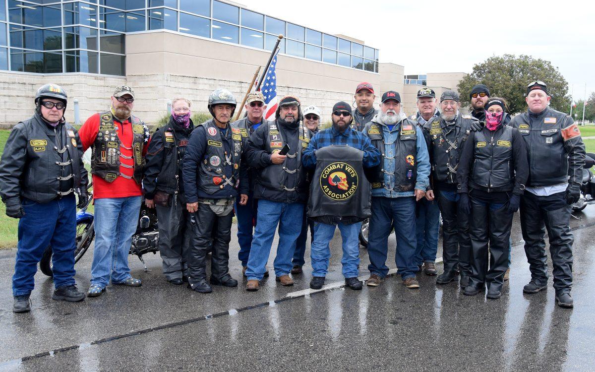 Members of the Combat Veterans Association pose for a photo, Saturday, Nov. 10, 2018, at the San Marcos Public Library.