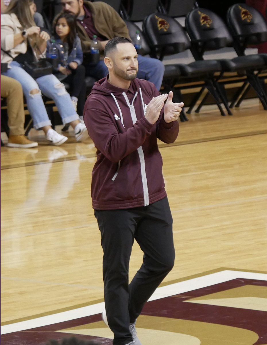 Texas State football head coach G.J. Kinne gets introduced at a mens basketball game following his hire, Sunday, Dec. 4, 2022.