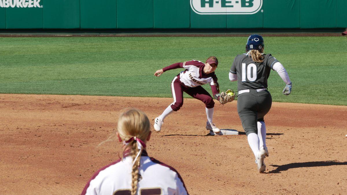 Texas State junior utility Hannah Earls (3) catches the force out at second which makes Villanova Wildcats sophomore infielder Ava Franz (10) out, Saturday, Feb. 11, 2023, at Bobcat Softball Complex. The Bobcats lost 4-2.
