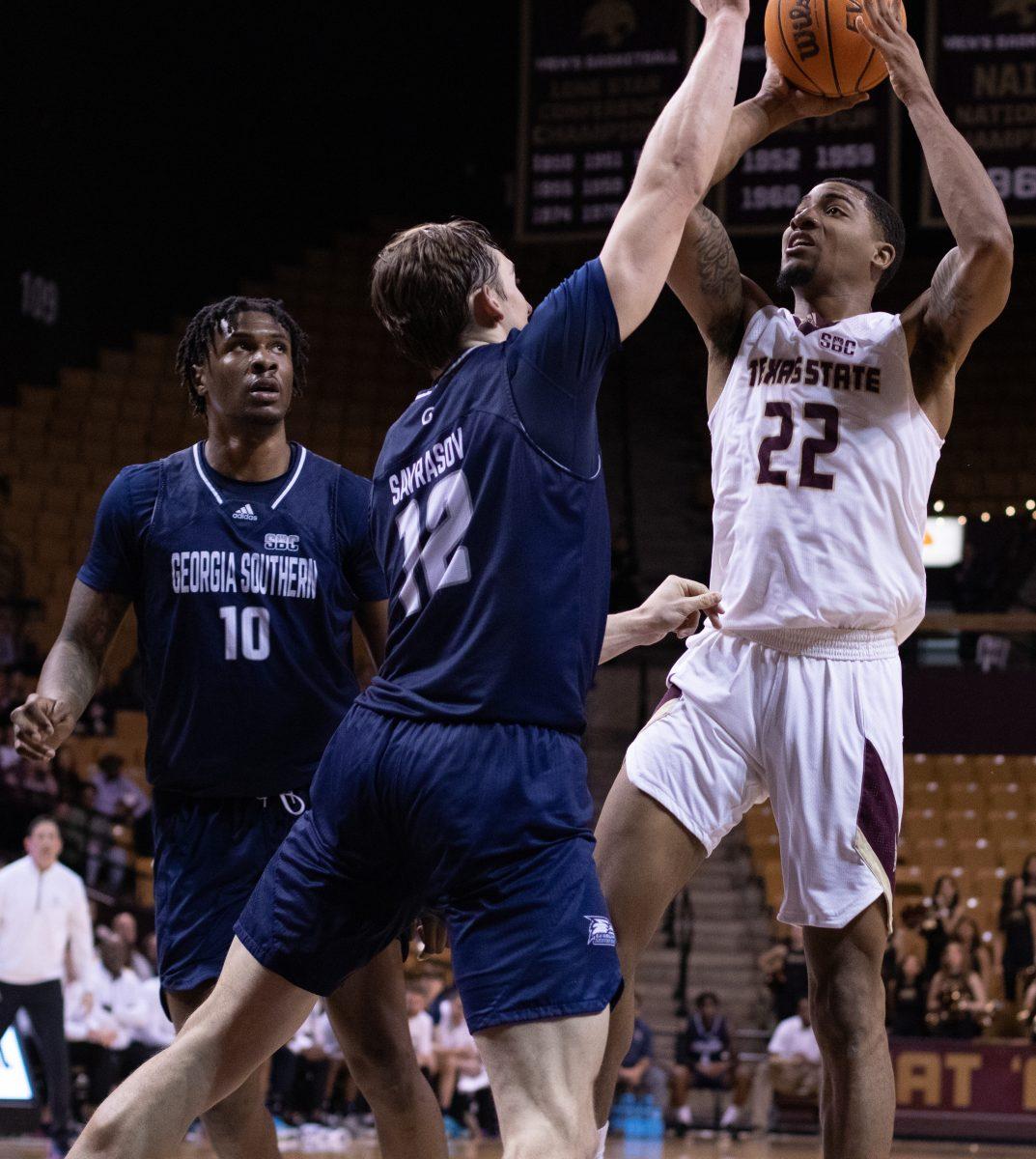 Texas State senior forward Nighael Ceaser (22) shoots against Georgia Southern University, Thursday, Jan. 26, 2023, at the Strahan Arena. The Bobcats won 70-67.