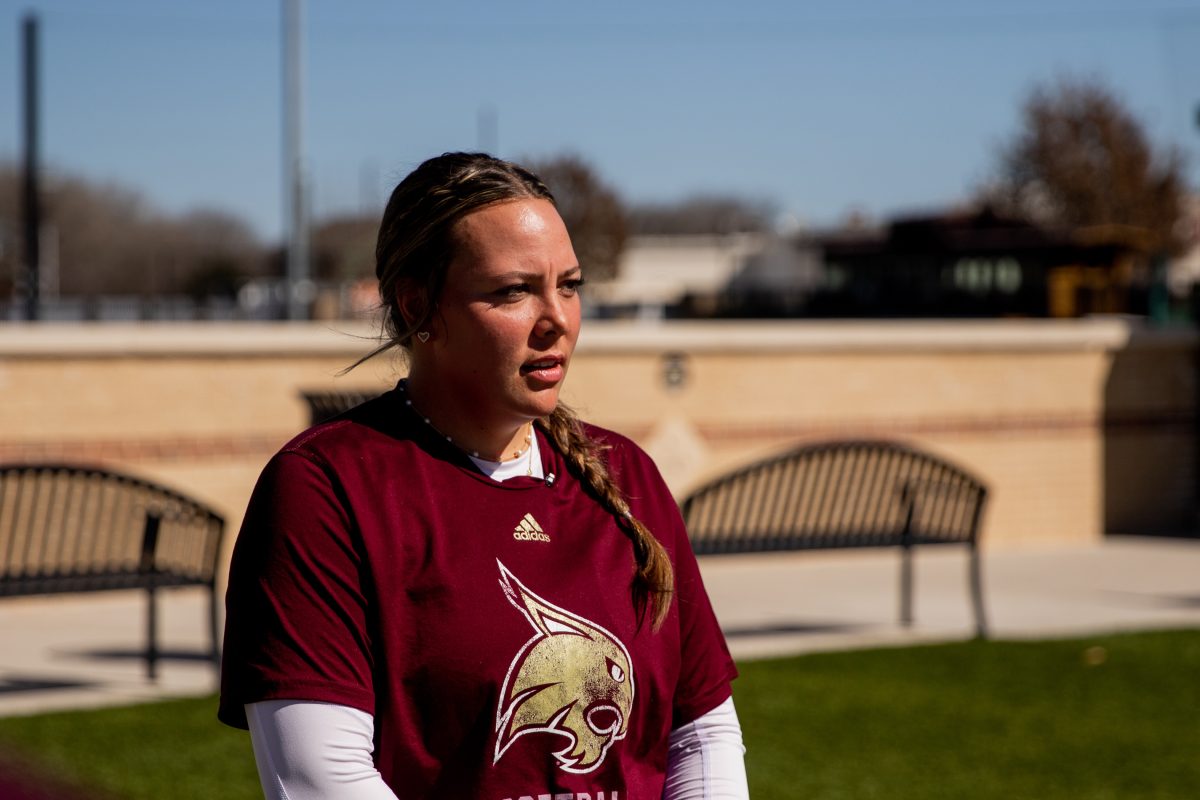 Texas State senior infielder Sara Vanderford (26) listens to questions from sports reporters about the upcoming season during the softball media day preview, Wednesday, Feb. 10, 2022, at Bobcat Ballpark.