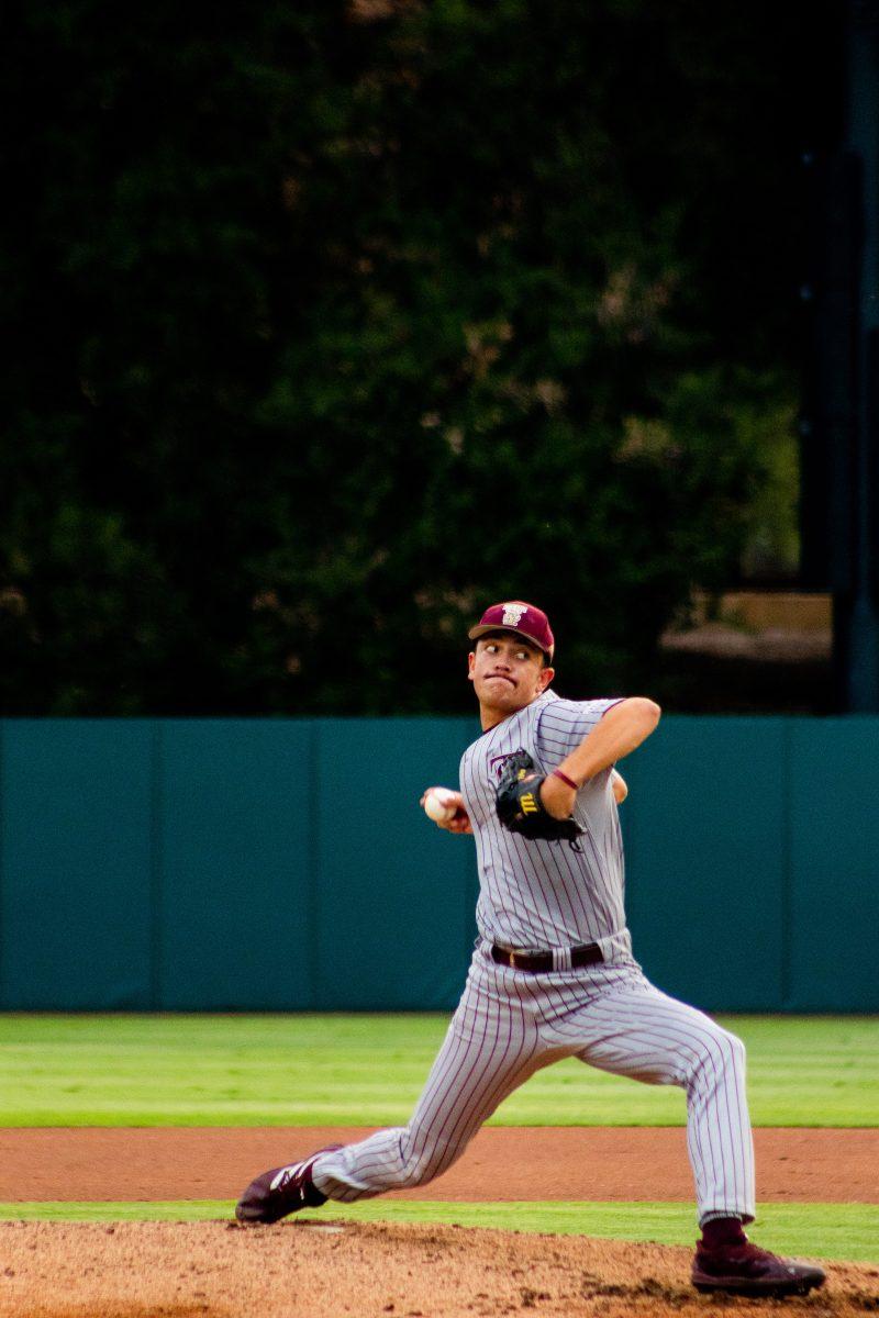 Texas State baseball junior pitcher Tony Robie (39) winds up to pitch against a Cardinal batter during a game against Stanford in the NCAA Stanford Regional, Sunday, June 5, 2022, at Klein Field at Sunken Diamond in Palo Alto, Calif.