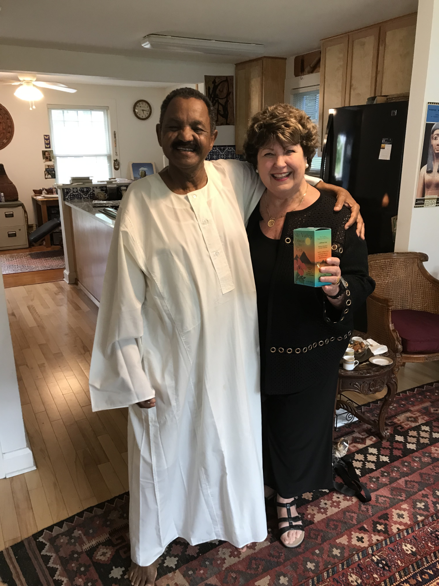 Awad Abdelgadir (left) and Kathleen Fite pose for a picture with a product from Nile Valley Herb Inc., Sunday, May 22, 2022, at Abdelgadirs home in Austin, Texas.