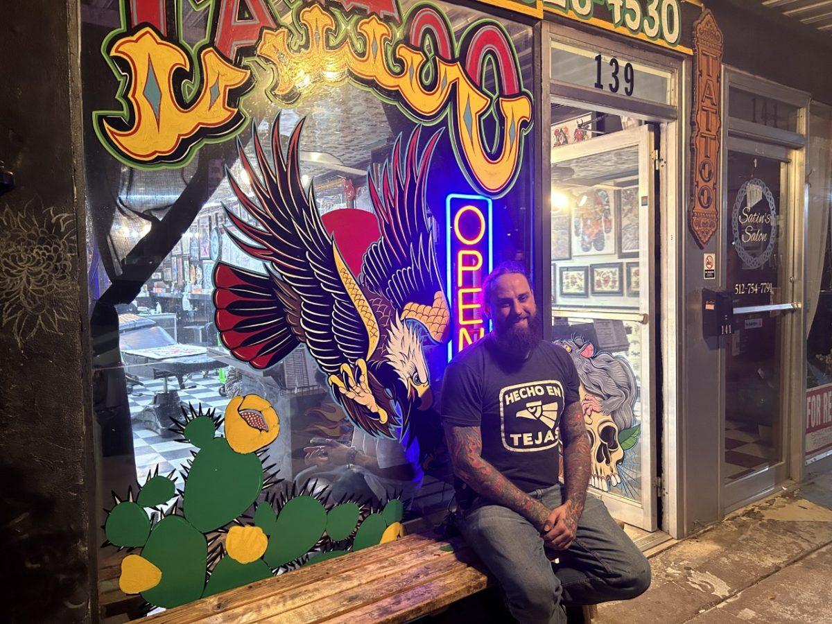 Jerry Lee sits in front of his shop, Jerrys Tattoo Shop, Thursday, March 30, 2023.