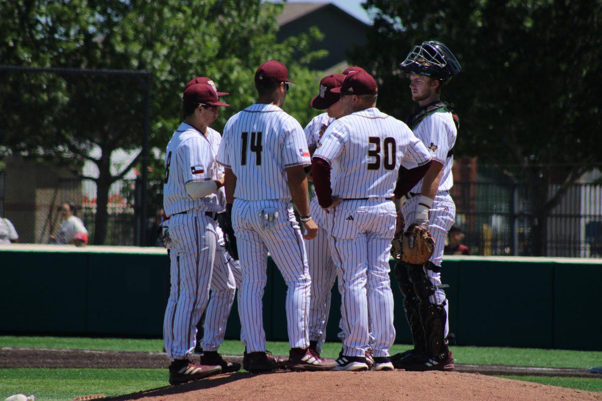Texas State baseball team gathers at the pitching mound to talk about the game plan, Monday, April 17, 2023, at Bobcat Ballpark. The Bobcats won 5-4.