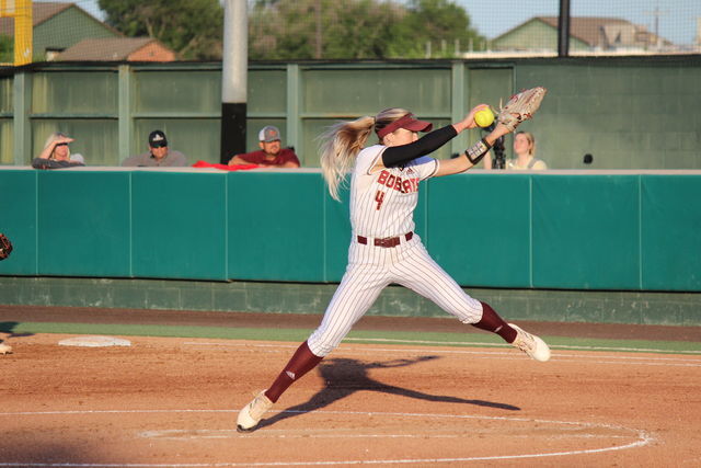 Junior Jessica Mullins (4) steps up to pitch before the fifth inning, Tuesday, April 12, 2023, at Bobcat Softball Stadium.