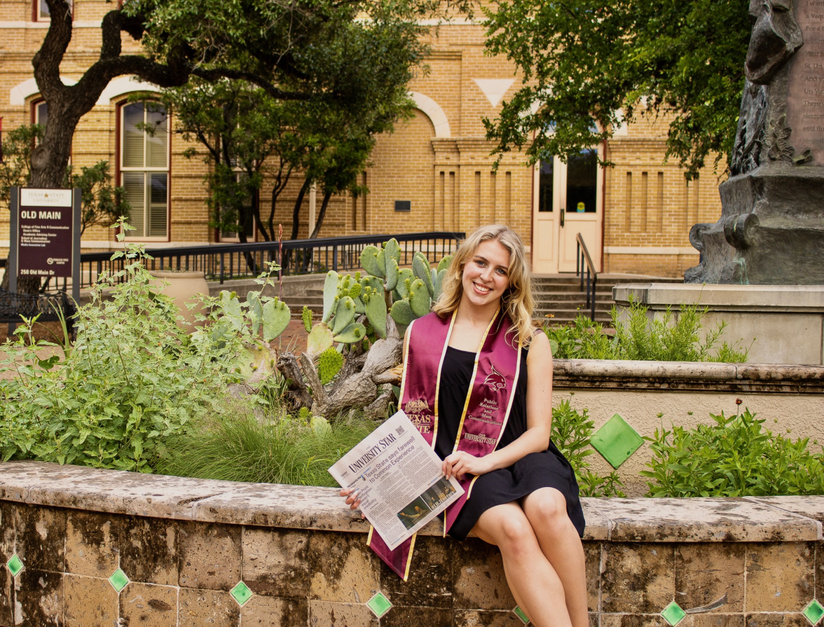 Texas State public relations and mass communications senior Elle Gangi poses for a graduation photo, Saturday, April 8, 2023, outside Old Main.