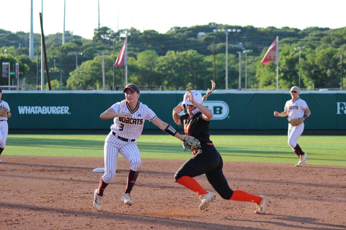 Junior utility Hannah Earls (3) tags South Houston player before she makes it to second base, Tuesday, April 12, 2023, at Bobcat Softball Stadium.