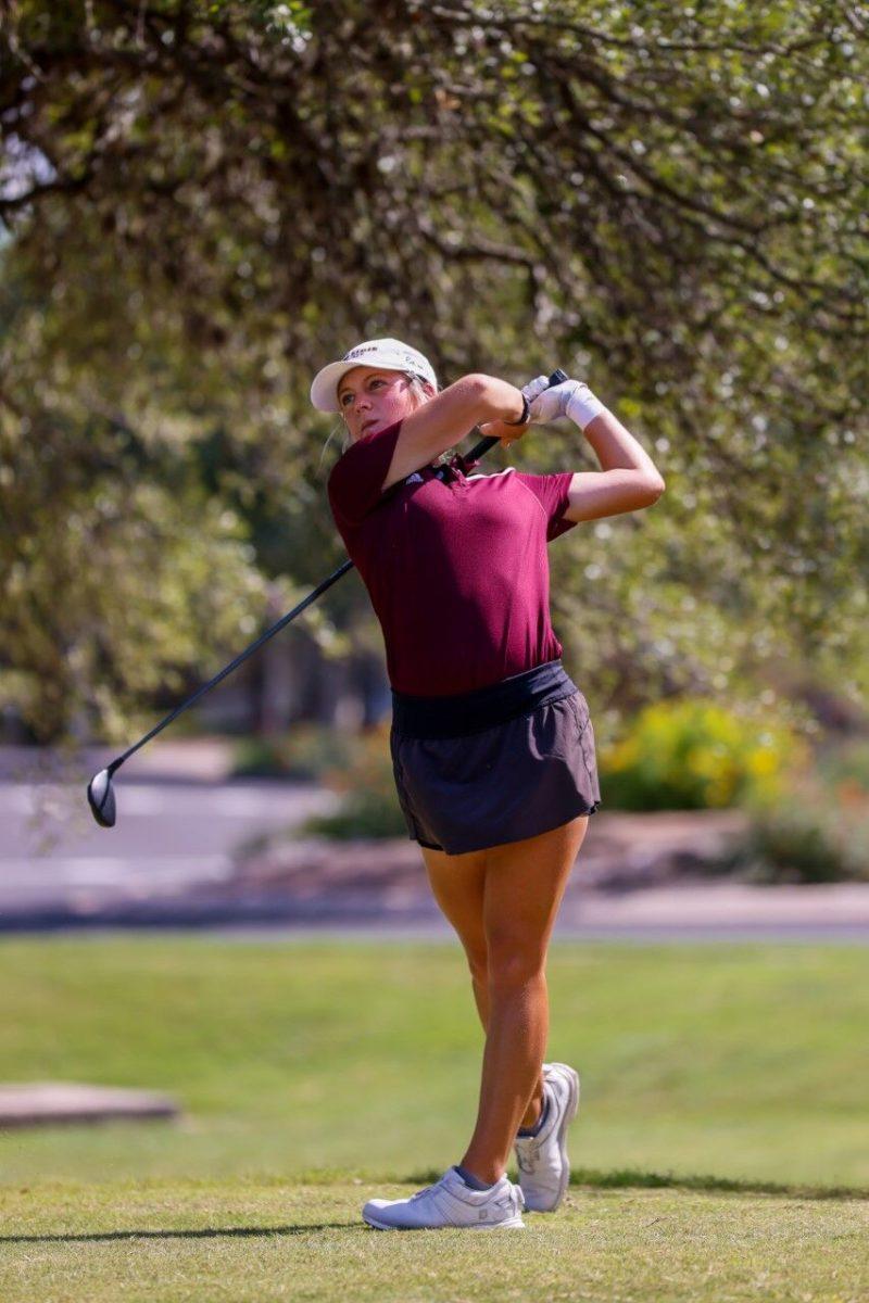 Sophomore Mattingly Palmer watches the ball after hitting it during practice at the Plum Creek Golf Club, September. 16, 2022.&#160;