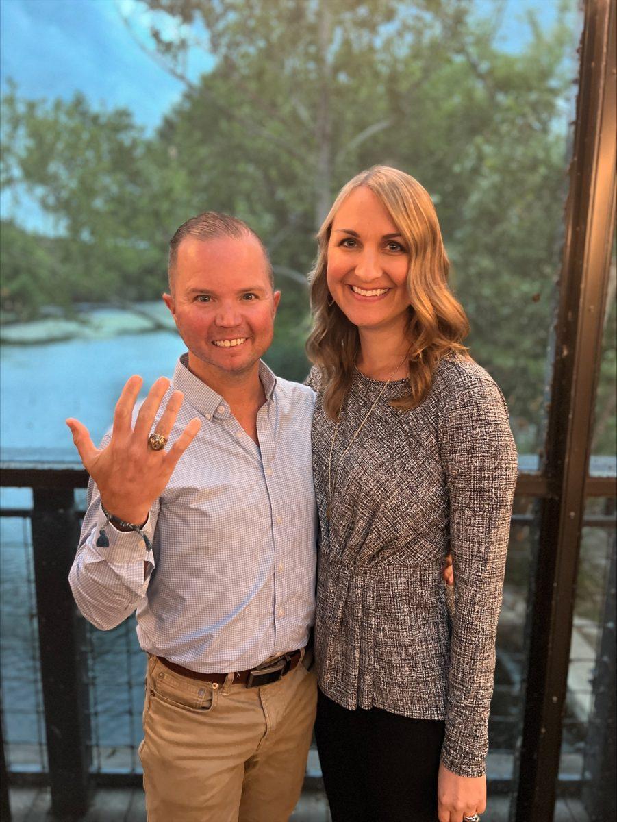 Mike Thompson (right) poses with his ring and his wife Kendall Burleson at the annual Ring Day ceremony, April 28, 2023, at the Meadows Center.