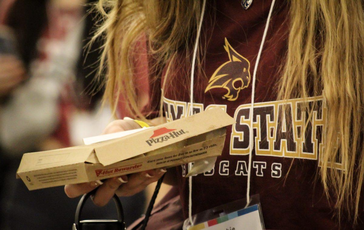 Incoming Texas State student Sophie Lemus grabs lunch during New Student Orientation, Wednesday, May 31, 2023, at LBJ Marketplace.