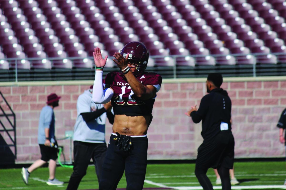 Texas State redshirt senior wide receiver Julian Orteaga-Jones rounds up the team and chants encouraging words, Saturday, April 1, 2023 at Bobcat Stadium.  