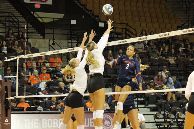 Texas+State+junior+Sophie+Childs+%289%29+and+sophomore+Bailey+Hanner+%2820%29+attempt+to+block+the+ball%2C+Saturday%2C+August+19%2C+2023%2C+at+Strahan+Arena.