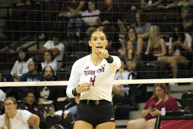 Texas State senior setter Ryann Torres (14) gives pointers to teammates, Saturday, August 19, 2023, at Strahan Arena.