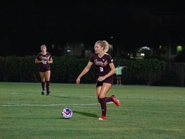 Texas State junior defender Lucy Hart (3) dribbles the ball past midfield during the game against North Texas at Bobcat Soccer Complex Thursday, Aug. 24, 2023.