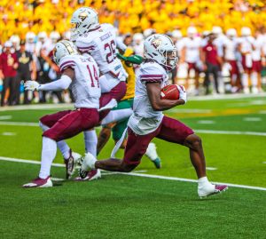 Texas State sophomore wide reciever Kole Wilson (2) runs after making a catch against Baylor, Saturday, Sept. 2, 2023, at McLane Stadium in Waco. 