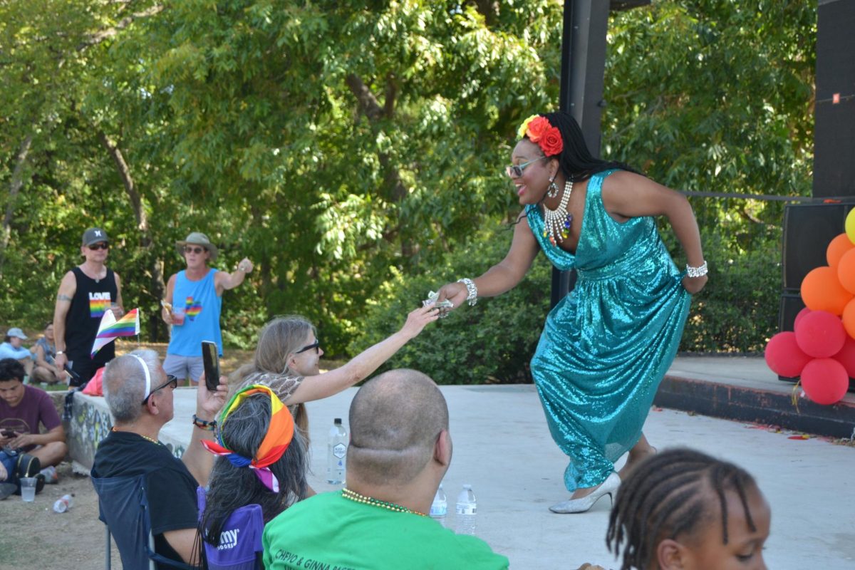 Local drag queen Brianna St. James performs on stage at SMTX Pride, Sept. 9, 2023, at San Marcos Plaza Park.