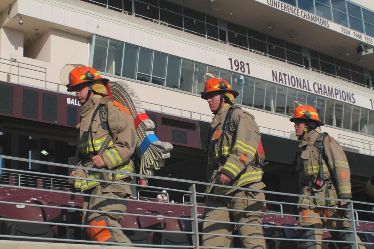 A list of the lives lost during 9/11 is carried by a local firefighter during his walk for the annual stair climb, Sunday, Sept. 10, 2023 at Bobcat Stadium.