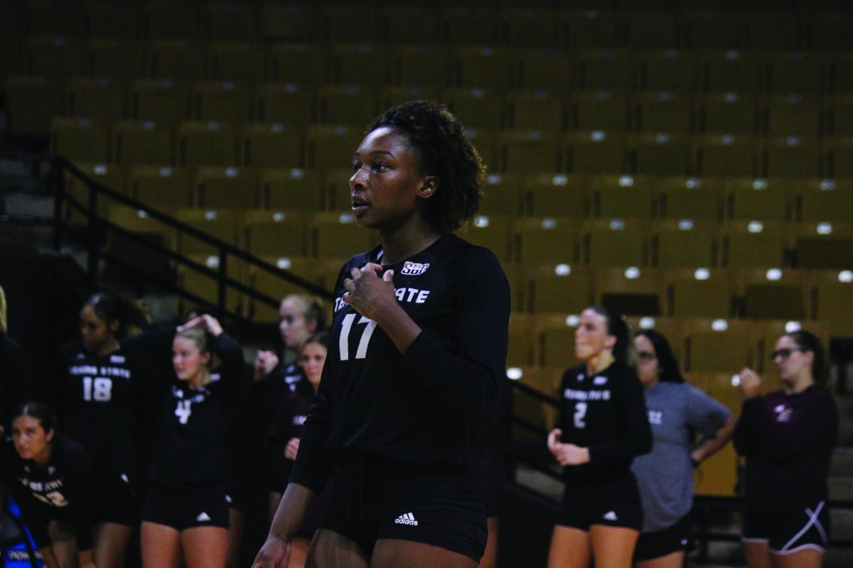 Texas State graduate student outsider hitter K.J. Johnson (17) warms up pre-game against North Texas, Thursday, Aug. 31, 2023 at Strahan Arena. 