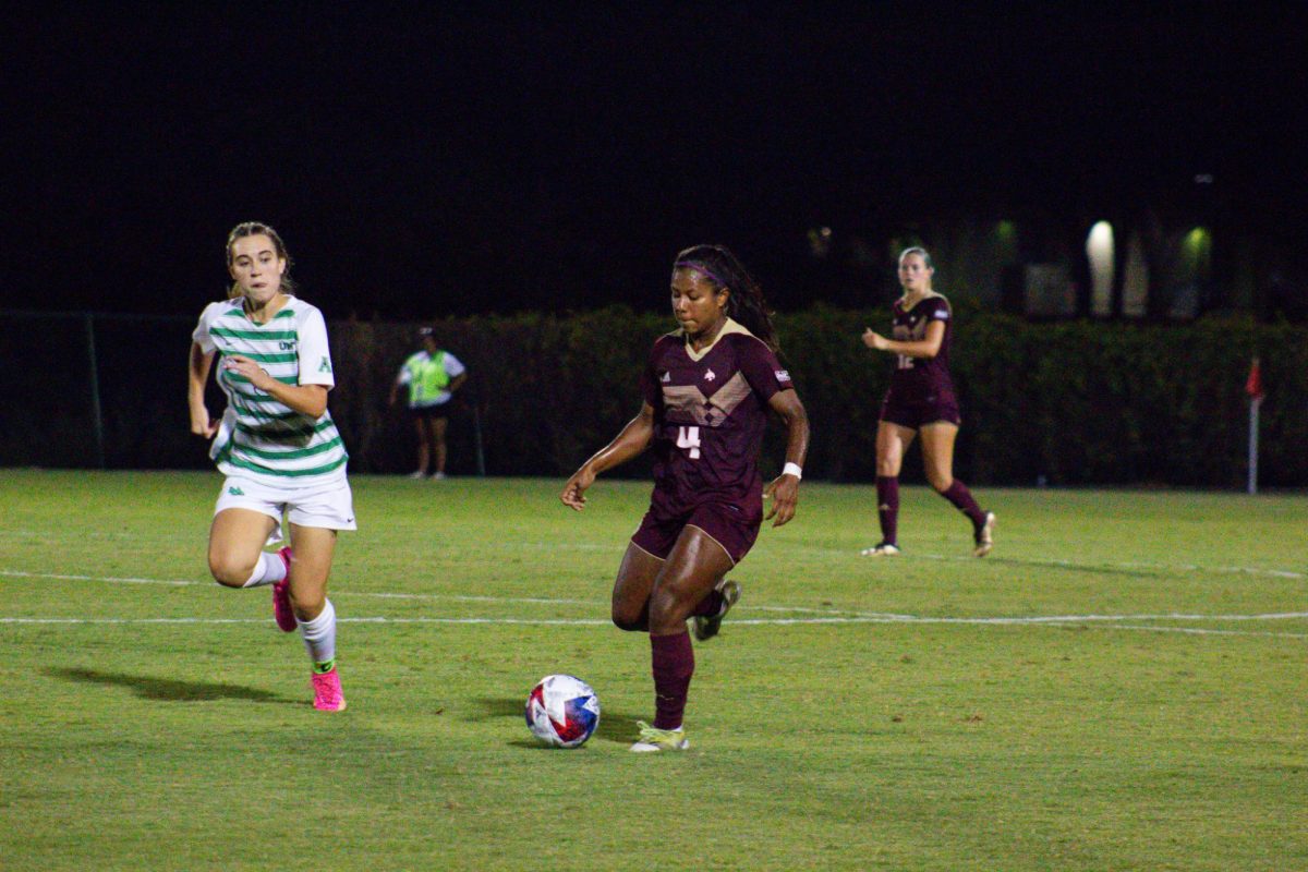 Texas State freshman midfielder Victoria Meza (4) dribbles the ball past a North Texas defender   Thursday, Aug. 24, 2023 at Bobcat Soccer Complex.