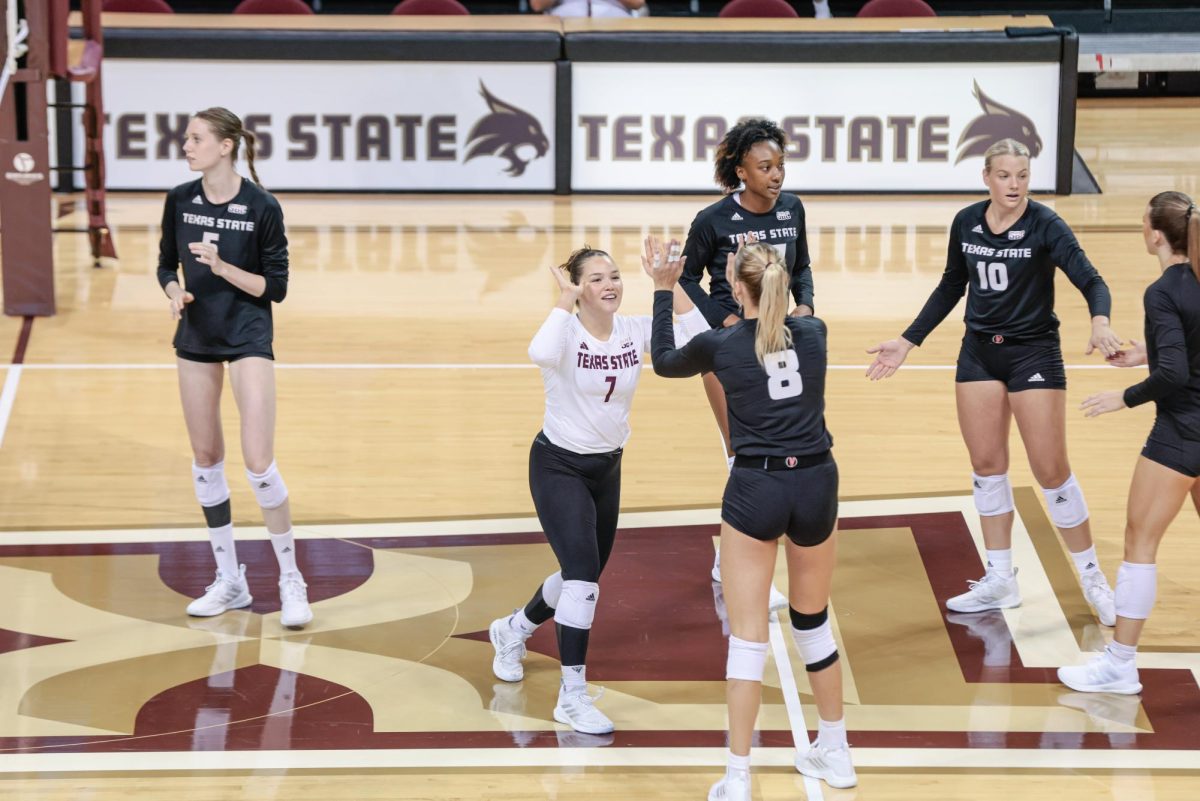 The Texas State volleyball team celebrates a point against Southeastern Louisiana, Thursday, Sept. 7, 2023, at Strahan Arena.