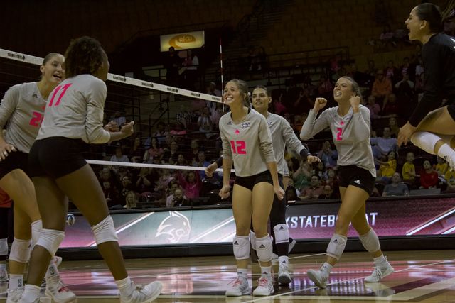 The Texas State volleyball team celebrates a point against South Alabama, Saturday, Oct. 21, at Strahan Arena.