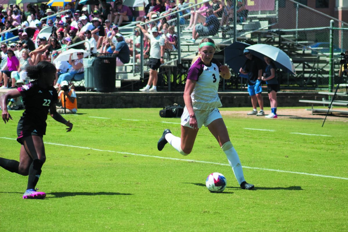 Texas State junior defender Lucy Hart (3) saves the ball from rolling out of bounds against Troy, Sunday, Sept. 24, 2023, at Bobcat Soccer Complex.
