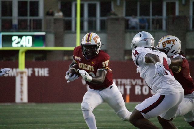 Texas+State+sophomore+running+back+Ismail+Mahdi+%2821%29+carries+the+ball+against+Troy%2C+Saturday%2C+Oct.+28%2C+2023%2C+at+Strahan+Arena.