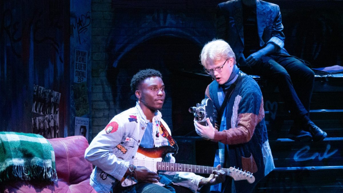 Tyler Wesley (left), actor for Roger Davis, and Riley Thornton (right), actor for Mark Cohen, rehearse a scene for RENT, Sunday, Nov. 12, 2023, at the Patti Strickel Harrison Theatre. 