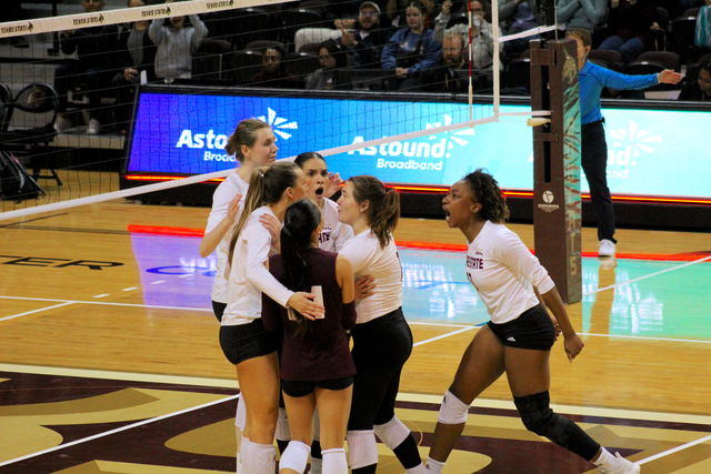 The Texas State volleyball team celebrates a point against Coastal Carolina, Friday, Nov. 10, 2023, at Strahan Arena.