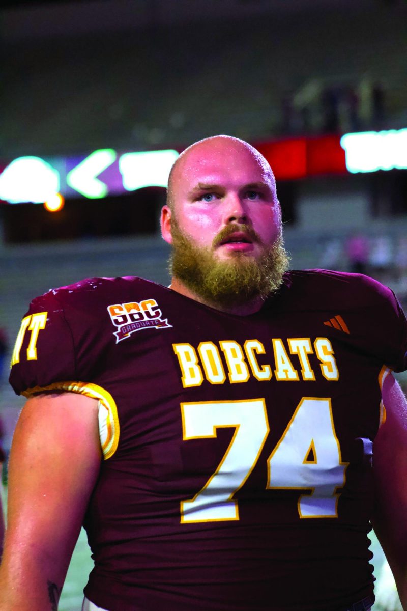 Texas State redshirt senior center Caleb Johnson (74) gazes at the crowd after the game versus Troy, Saturday, Oct. 28, 2023, at Bobcat Stadium.