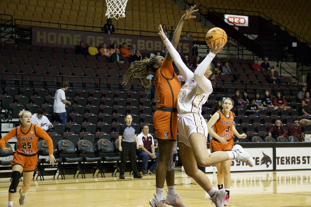Texas State senior forward Nicole Leff (40) shoots the ball over the head of her Bowling Green defender, Saturday, Nov. 11, 2023, at Strahan Arena.