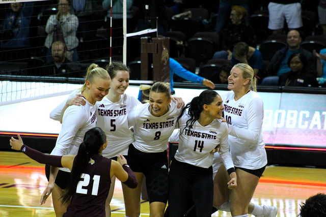 The Texas State volleyball team celebrates a point during the Coastal Carolina game, Friday, Nov. 10, 2023, at Strahan Arena. 