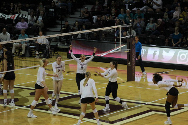The Texas State volleyball team celebrates a point against Coastal Carolina, Friday, Nov. 10, 2023, at Strahan Arena.