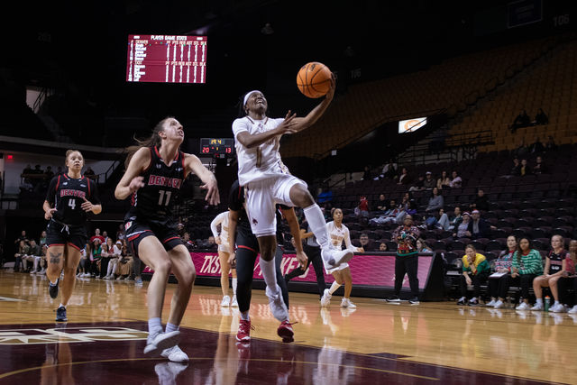 Texas State graduate guard JaNiah Henson (1) goes in for a layup during the game against Denver, Thursday, Dec. 14, 2023, at Strahan Arena.