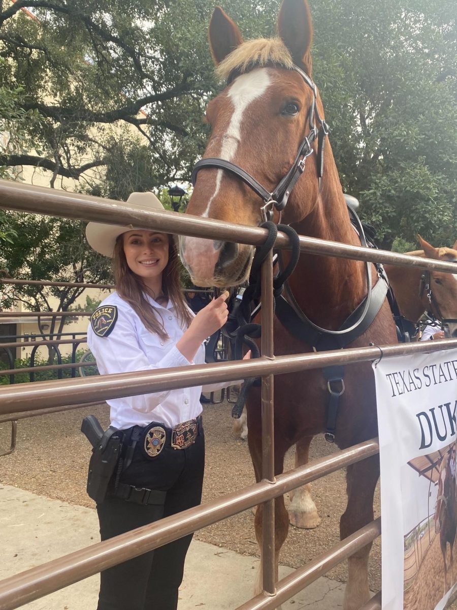 Corporal Haley Mclaren and Duke introducing the Mounted Patrol, Nov. 8, 2023, on the Quad.