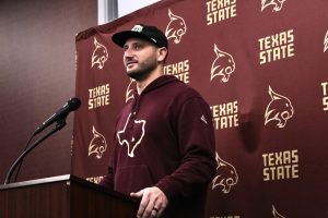 Texas State head football coach G.J. Kinne speaks during a press conference, Monday, Dec. 4, 2023, at Bobcat Stadium. 